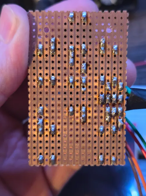 Back of the tactile button array showing the hand-soldered wiring