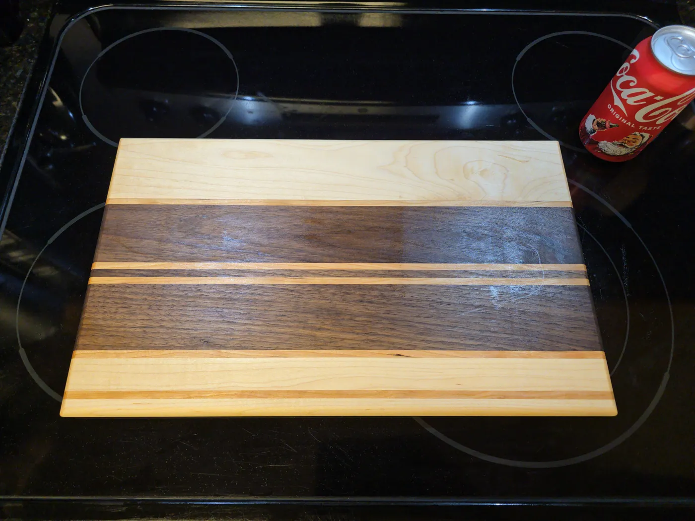 Finished walnut and maple striped cutting board
