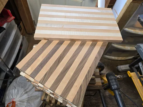 Two board blanks after an initial pass of sanding