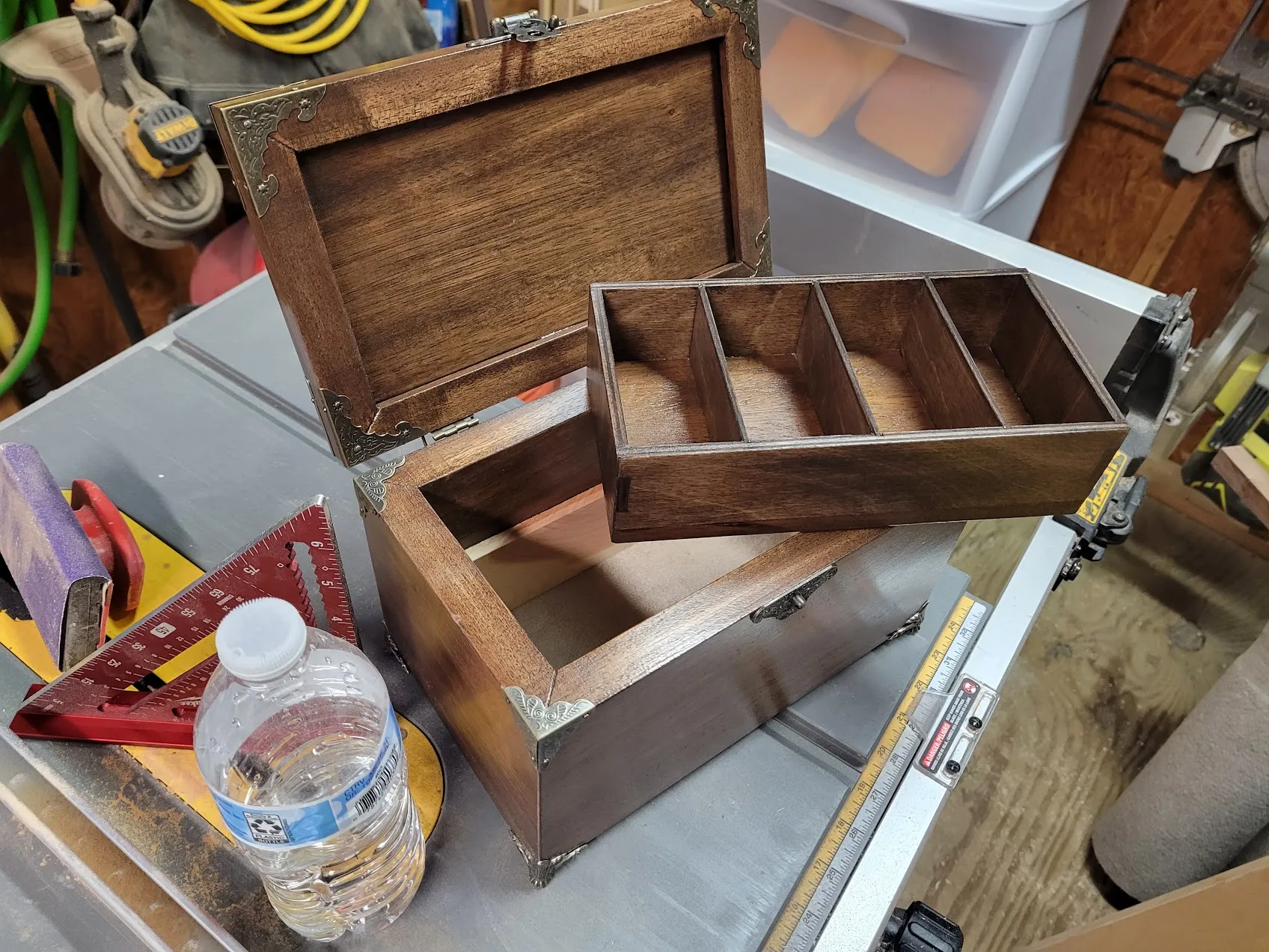 Jewelry box with the tray lifted out, revealing the cedar bracket and velvet-lined bottom