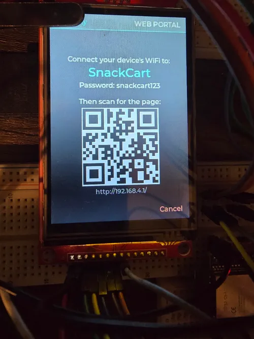 Device screen showing the WiFi network name, password, and a QR code that links to the admin page